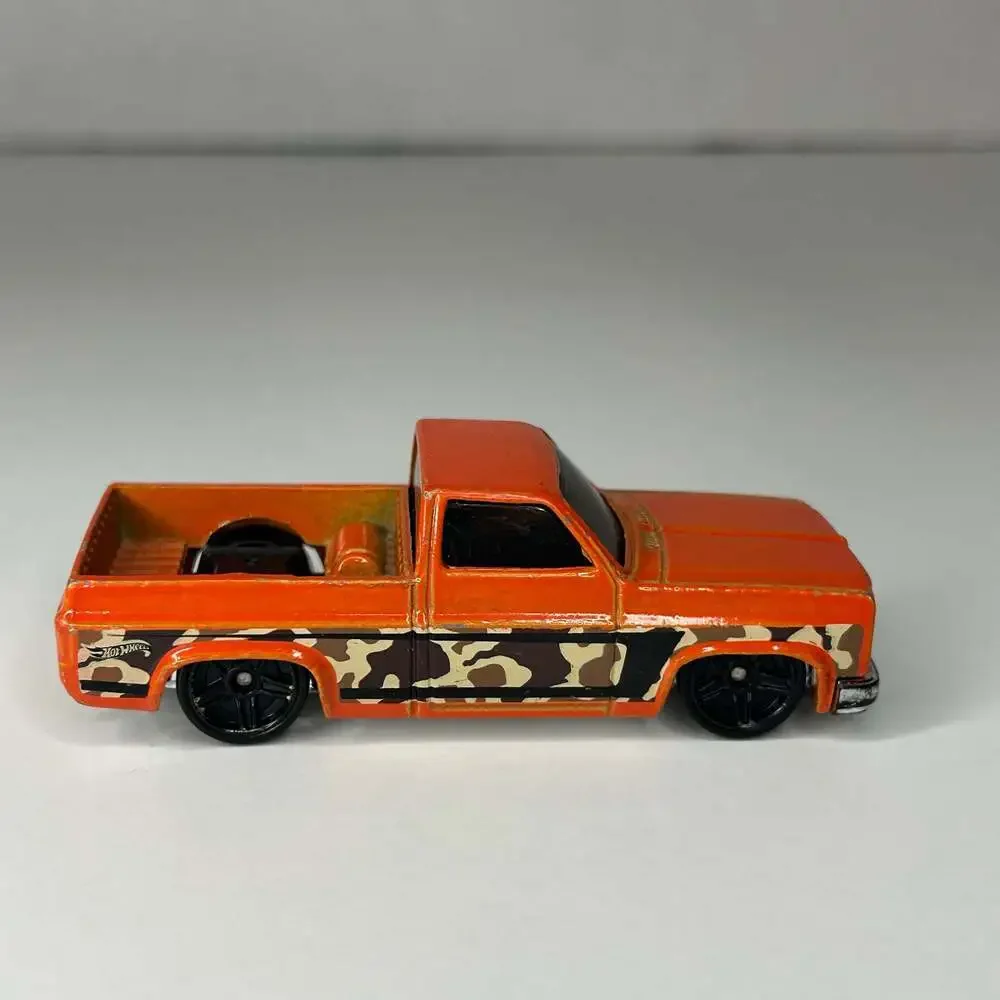 Hot Wheels 83 Chevy Silverado Orange Camouflage Truck